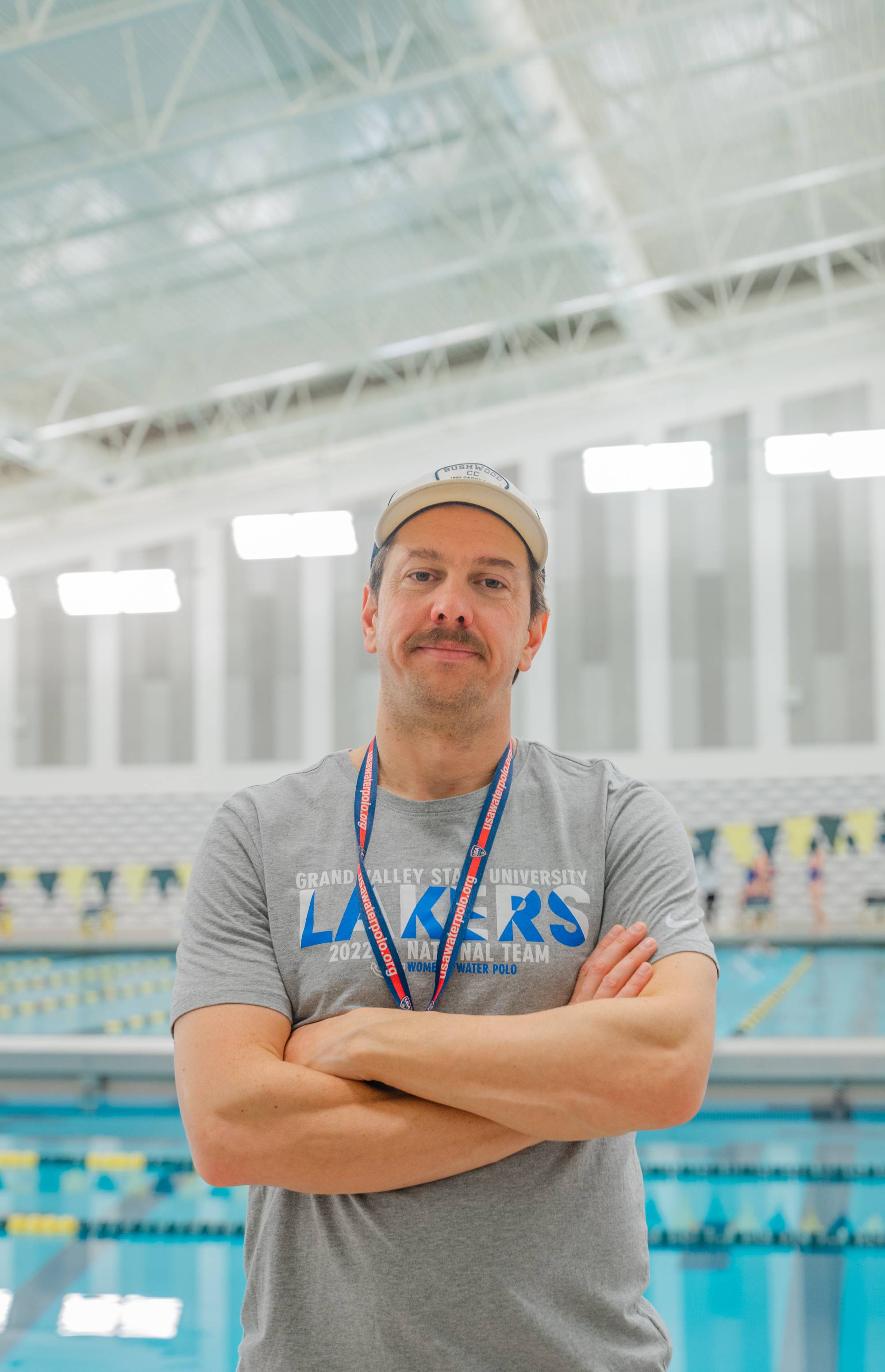 Coach Josh looking at camera and smiling